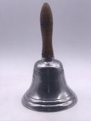 A reception hand bell 'Ring for Attention'