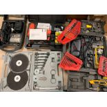 A selection of power tools and accessories including a staple gun