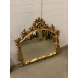 A gilt over mantle wall mirror with carved frame (120cm x 112cm)