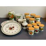 A selection of Pomonia, Portmeririon china, including storage jars, wall clocks, vases etc