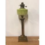 A brass column oil lamp