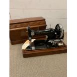 A Frister & Rossman case Vintage sewing machine.
