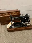 A Frister & Rossman case Vintage sewing machine.