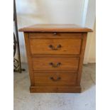 An oak bedside with three drawers (H64cm W55cm D54cm)