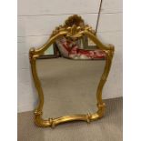 A gilt frame shield mirror (90cm x 55cm)