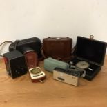 A Volume of Vintage cameras and equipment to include A Minolta A5, IKonta and Box Brownie etc.