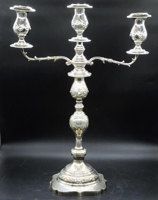 A Shabbat patterned three light candelabra , hallmarked London 1927 (895g)
