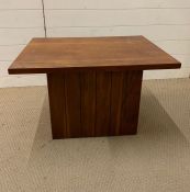 A small contemporary wooden coffee table (H46cm W71cm D51cm)