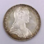 A Maria Theresa thaler silver bullion coin.