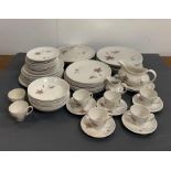 A substantial amount of Royal Doulton 'Tumbling Leaves' pattern china dinner service.