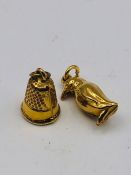 Two 9ct gold charms (1.2g)