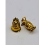 Two 9ct gold charms (1.2g)