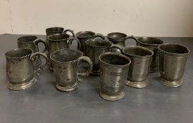 Twelve Half Pint Pewter vessels to include tankards, beakers, cider cup, various makers and marks.