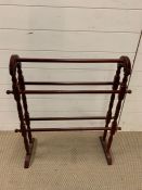 A wooden towel rail (H77cm W63cm)