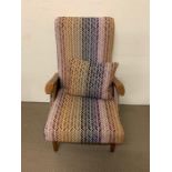 A Mid Century reupholstered open armchair