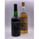 A Bottle of Glenmorangie whisky and a bottle of Cockburns ruby port