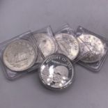 Five collectable silver coins