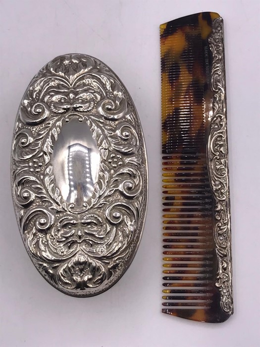 A Ladies silver backed brush and hallmarked silver handled comb. - Image 4 of 4