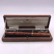 A Vintage Waterman and Parker ink pens