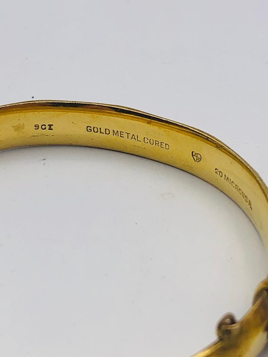 A 9ct gold metal cored bangle - Image 3 of 6