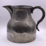 A One Gallon Pewter jug, belonged to Admiral Sir Walter Cowan.