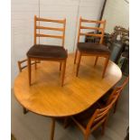 A Schreiber Dining Table and Six Chairs