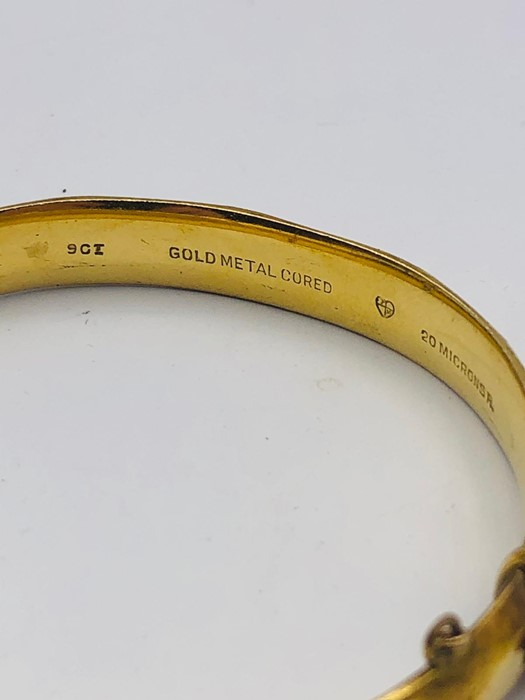 A 9ct gold metal cored bangle - Image 6 of 6
