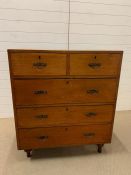 A two part chest of drawers, two short over three long (H106cm W92cm D50cm)