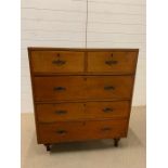 A two part chest of drawers, two short over three long (H106cm W92cm D50cm)