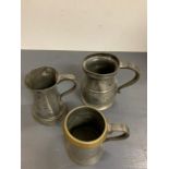 Three pewter pint tankards, various styles, makers and marks.