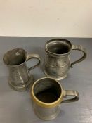 Three pewter pint tankards, various styles, makers and marks.