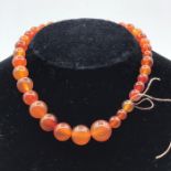 A graduated Amber beads necklace.