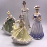 A selection of four china figures, two by Royal Doulton and two others.