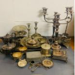 A Large volume of silver plate items to include candlesticks etc.