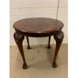 A centre table on ball and claw feet (H68cm Dia70cm)