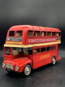 A decorative tin red London double decker bus 30cm L x 17cm H