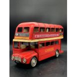 A decorative tin red London double decker bus 30cm L x 17cm H