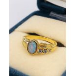 An Australian Opal ring on untested gold metal setting