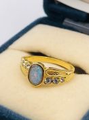 An Australian Opal ring on untested gold metal setting