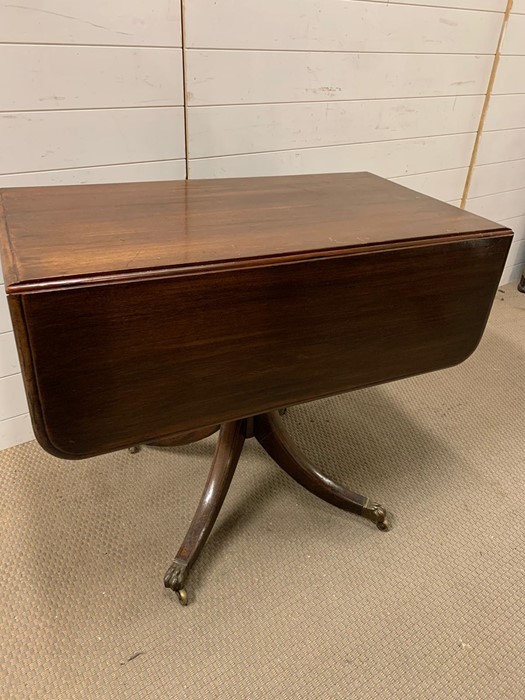 A drop side sofa table on splay feet with brass claws - Image 4 of 4