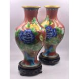 A Pair of Contemporary Cloisonné vases on stands.