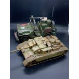 A decorative tin military toy vehicle