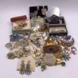 A Large Volume of Costume Jewellery to include earrings, bracelets etc.