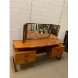 A Mid Century G Plan Dressing Table and stool (W 150 cm x D 47 cm x H 74 cm)