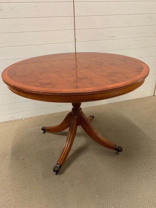 Circular centre table on four down swept legs (H78cm Dia 109cm)