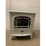 A White Dimplex electric, wood burning stove style electric heater.