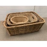Three wicker baskets of various sizes (82cm x 60cm largest one)