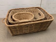 Three wicker baskets of various sizes (82cm x 60cm largest one)