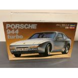 A boxed model kit of Porsche 944 Turbo