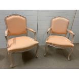 A pair of Louis XV style fauteuils (chairs) with cartouche shaped backs, arms and seats on